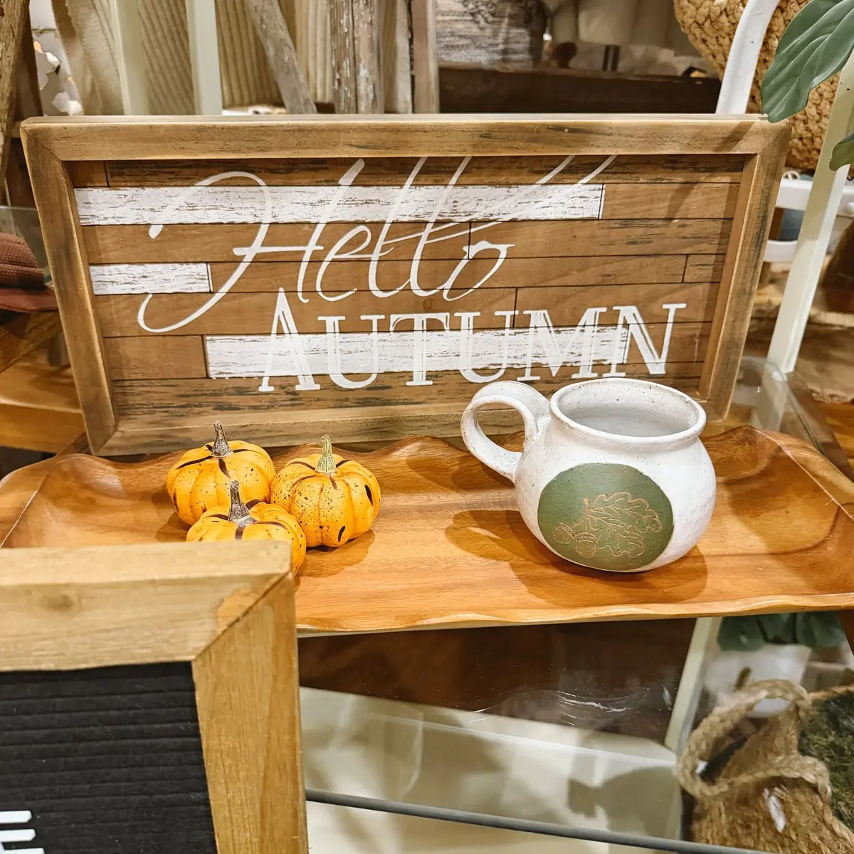 Hello Autumn wooden sign with a stoneware mug and small pumpkins